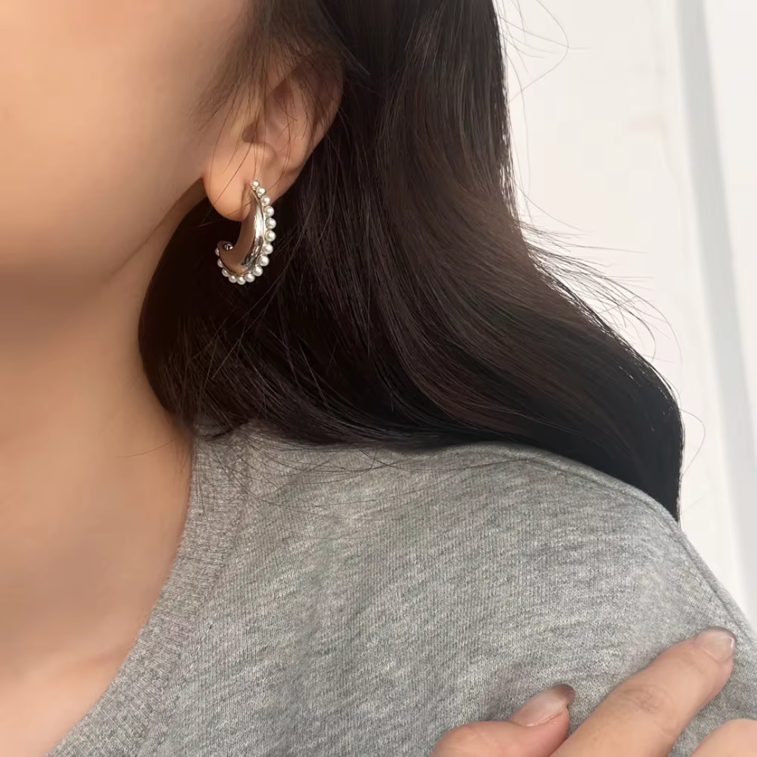 Crescent pearl earrings
