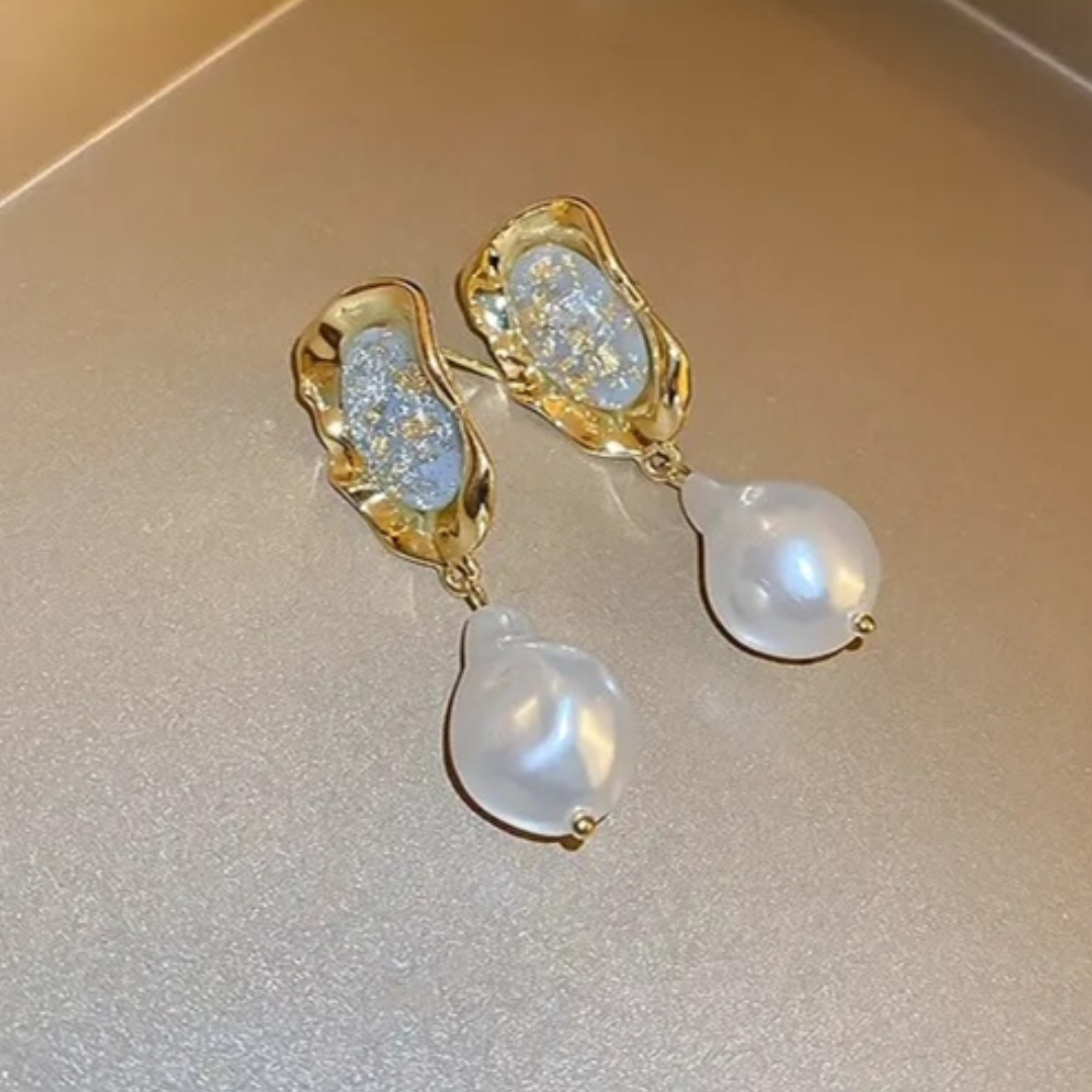 Iridescent pearl drop earring