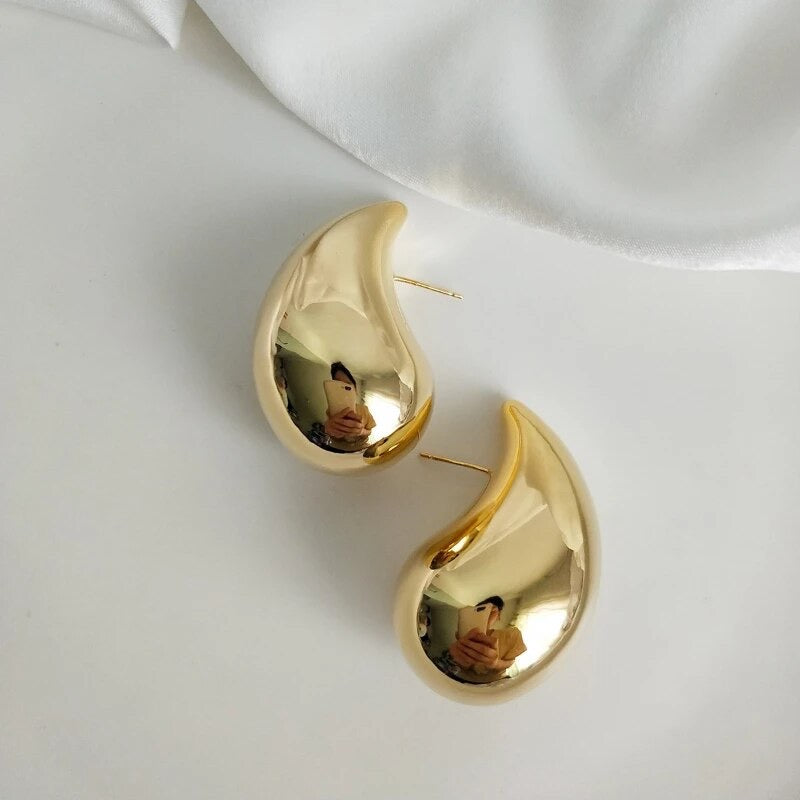 Gold and silver drop earrings