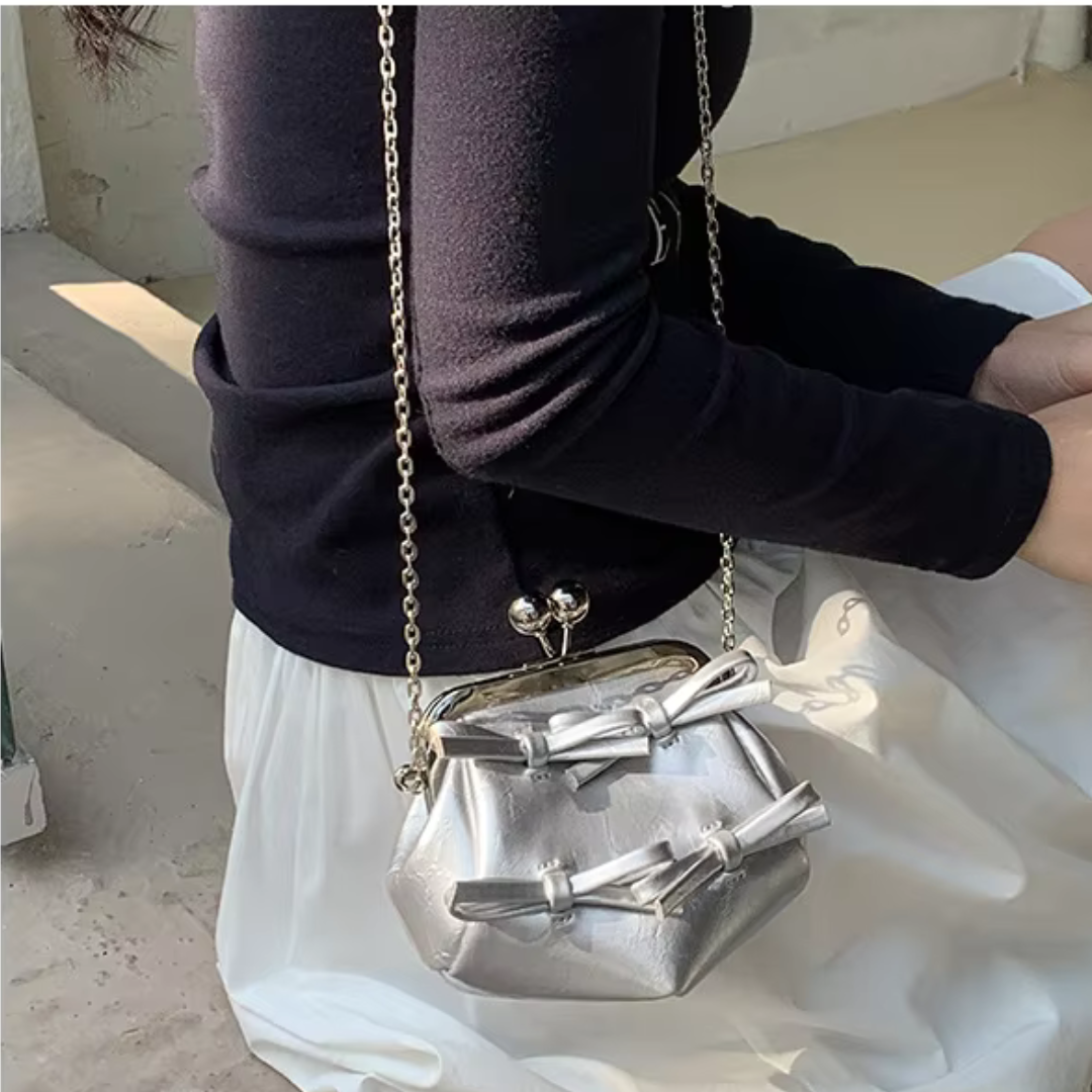 Claris Bow Clutch Bag