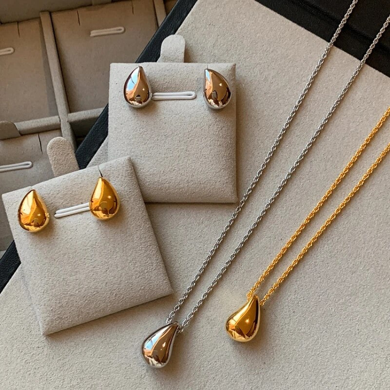 Gold and silver drop necklaces